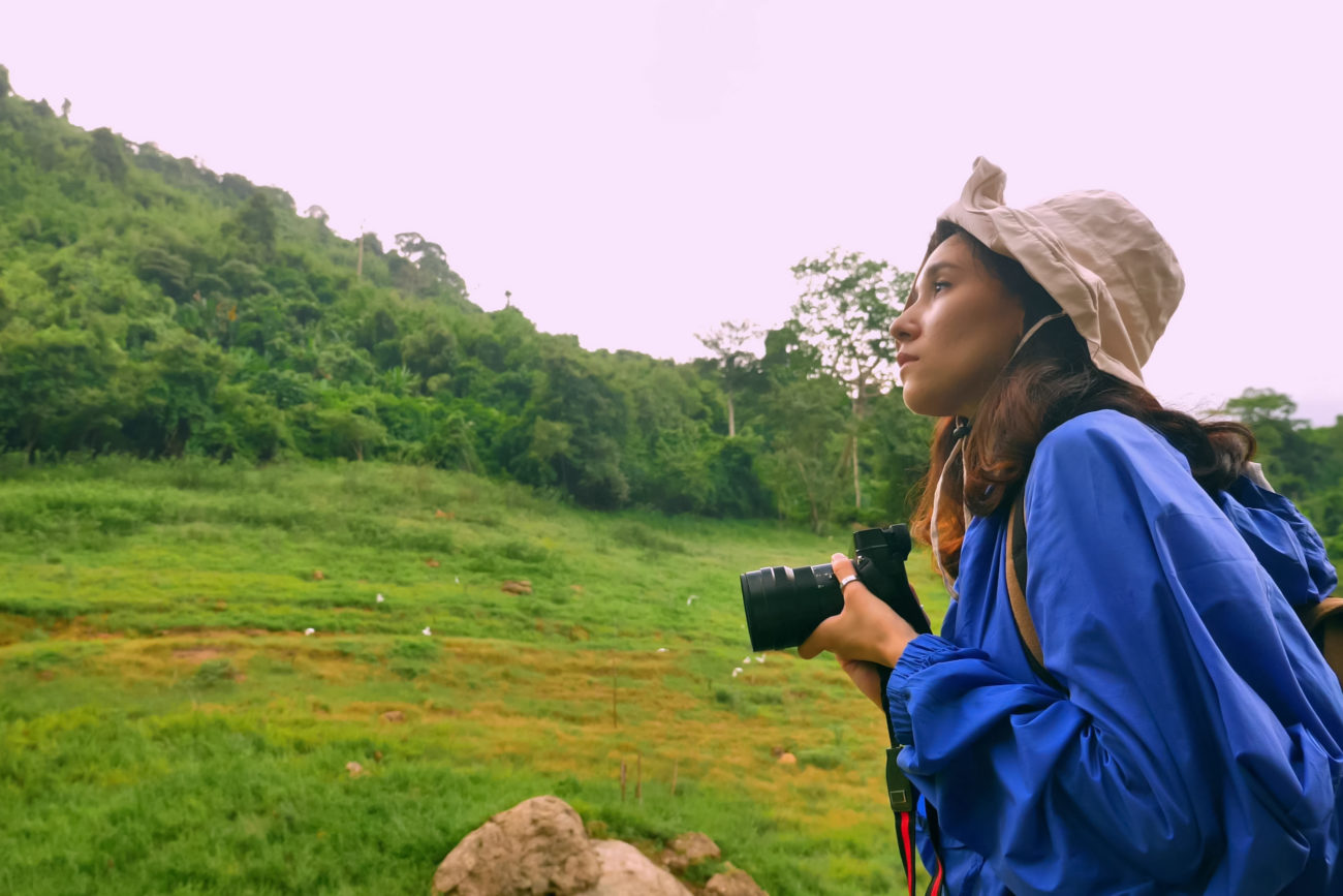 Young woman backpacker enjoy the view at mountain